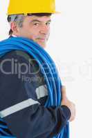 Mature repairman with rolled wire