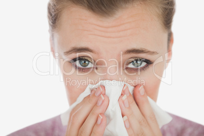 Portrait of woman suffering from cold