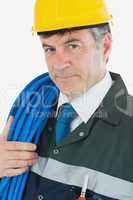 Portrait of repairman with large wire and hardhat