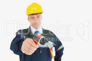 Technician holding cordless drill
