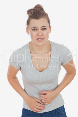 Woman suffering from stomach pain