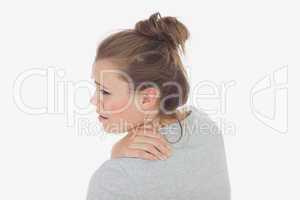 Young woman suffering from backache