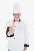 Mature chef gesturing thumbs up