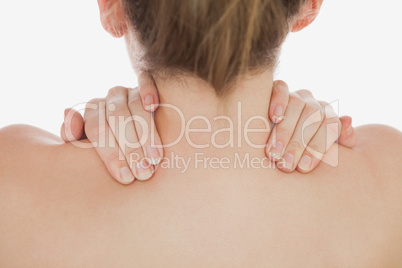 Close-up of of woman massaging neck