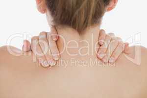 Close-up of of woman massaging neck