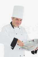 Chef with whisk and bowl