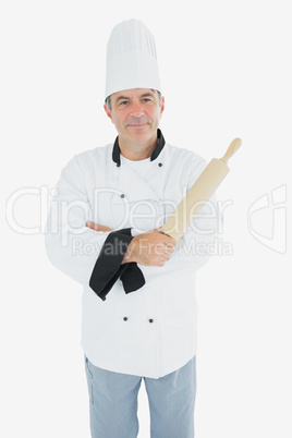 Male chef holding rolling pin