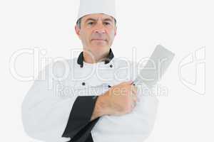 Chef holding meat cleaver