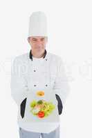 Chef offering fresh meal