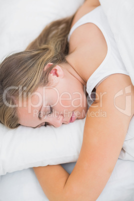 Overhead view of serene woman sleeping