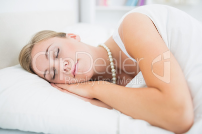 Sleeping woman with pearls necklace