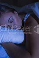 Beautiful woman sleeping at night