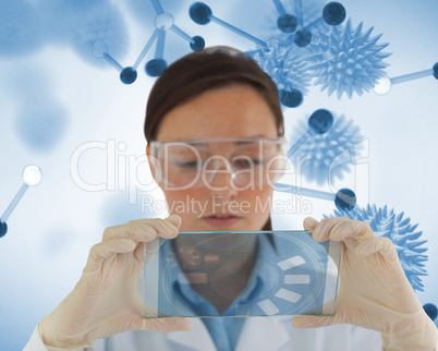 Careful nurse holding a virtual screen