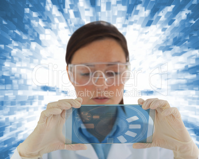Thoughtful nurse holding a virtual screen