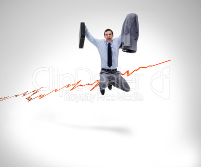 Joyful businessman jumping in the air