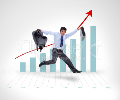 Happy businessman jumping in the air Happy businessman jumping in the air