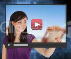 Woman pointing on touch screen with video