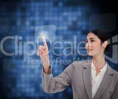 Businesswoman pressing button on touch screen against a backgrou