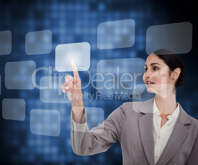 Businesswoman in suit pressing button on touch screen