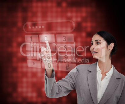 Businesswoman standing against a red background