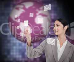 Businesswoman working with envelopes on touch screen