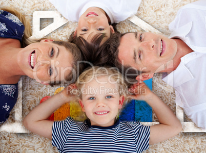 Smiling young family in front of house illustration