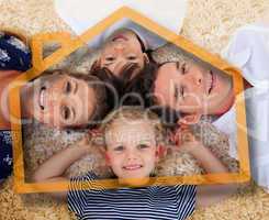 Smiling young family in front of orange house illustration
