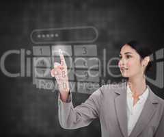 Businesswoman using touch screen against a background