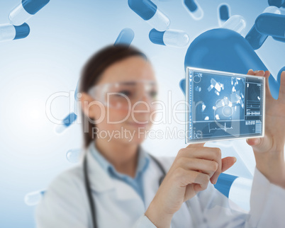 Smiling nurse holding virtual screen