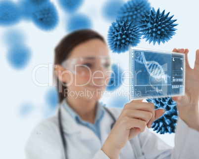 Smiling nurse working with virtual screen