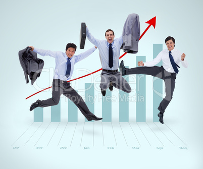 Businessmen jumping against a graphical presentation