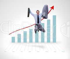 Successful businessman jumping before graphical presentation