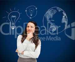Businesswoman standing against a picture of bulbs and globe