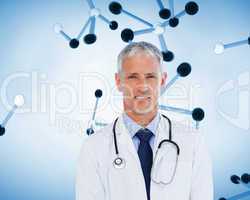 Smiling doctor standing with stethoscope on his neck