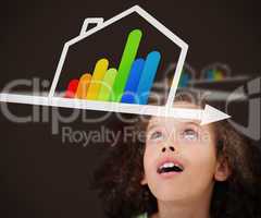 Surprised girl looking up at energy efficient house graphic