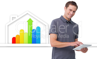 Man using tablet against energy efficient house graphic