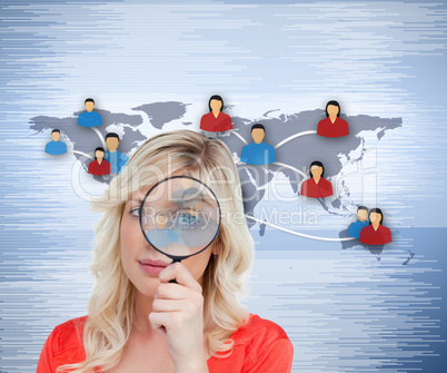 Woman looking through the magnifier