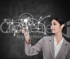 Businesswoman`s finger touching screen against a background
