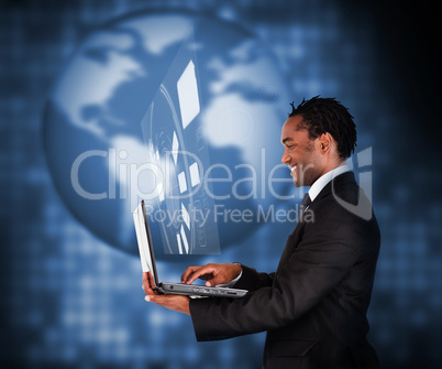 View of businessman using laptop