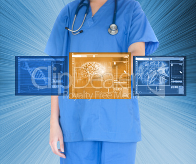 Doctor using touchscreen against blue background