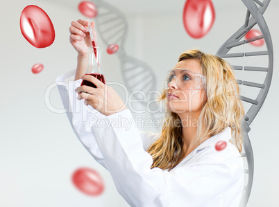 Female scientist examining blood