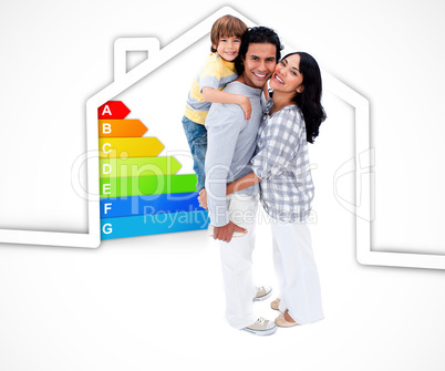 Smiling family standing with a house illustration with energy ra