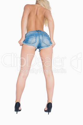Woman in hot pants and high heels