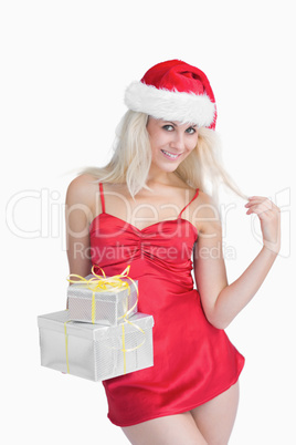 Happy woman holding christmas presents