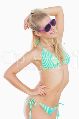 Sexy young woman posing with sunglasses