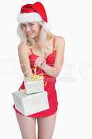Woman opening christmas present