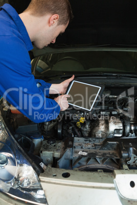 Mechanic using tablet computer