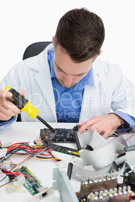 Close-up of computer engineer repairing sound card