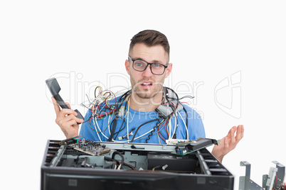 Confused it professional with cables and phone in front of open