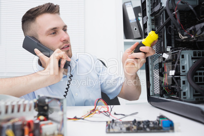 Computer engineer working on cpu while on call